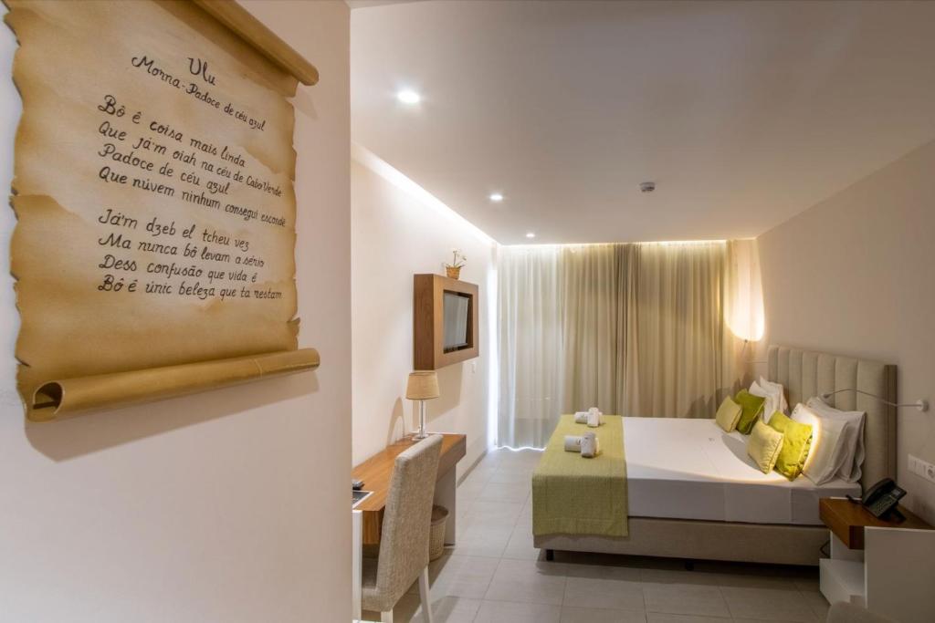 Postel nebo postele na pokoji v ubytování Luna Boutique Hotel