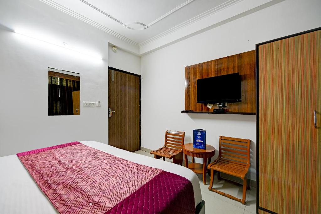 Postel nebo postele na pokoji v ubytování Airport Hotel Kiara - New Delhi Airport