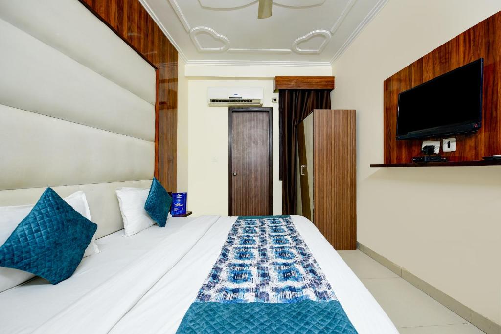 Postel nebo postele na pokoji v ubytování Airport Hotel Kiara - New Delhi Airport