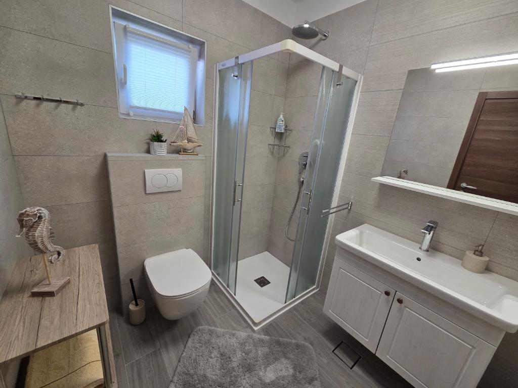 Koupelna v ubytování Apartments & Rooms Nensi