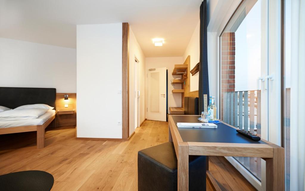 Postel nebo postele na pokoji v ubytování Im-Jaich Hotel Bremerhaven