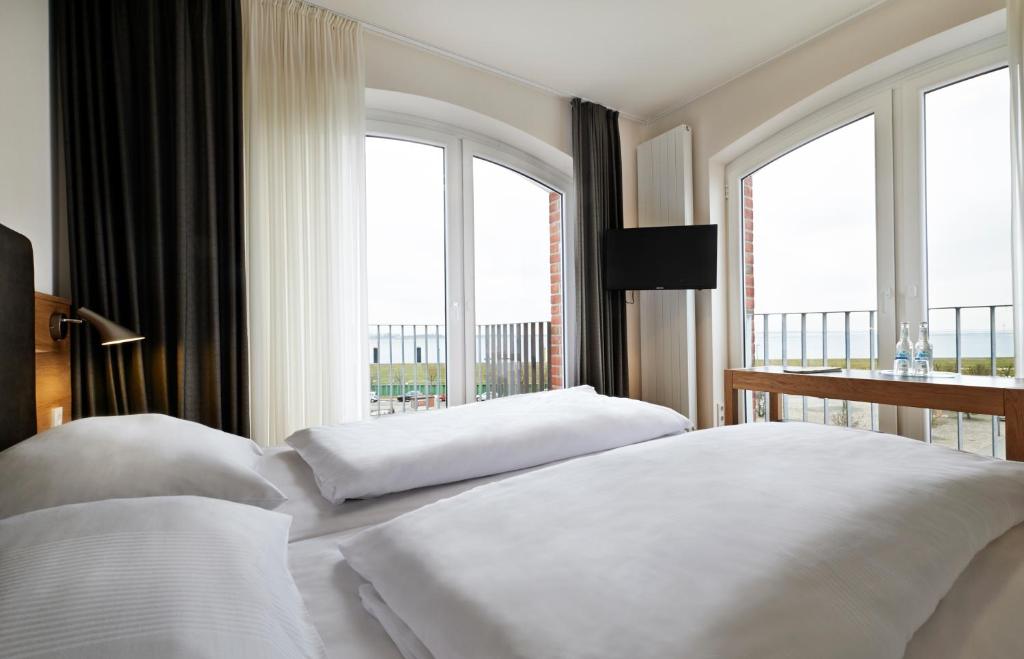 Postel nebo postele na pokoji v ubytování Im-Jaich Hotel Bremerhaven