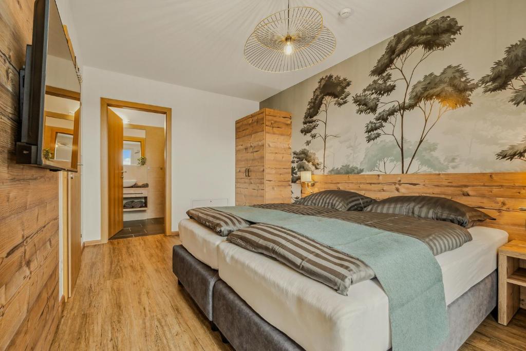Postel nebo postele na pokoji v ubytování Design-Apartment Katschi - Entspannung auf 1641m Höhe
