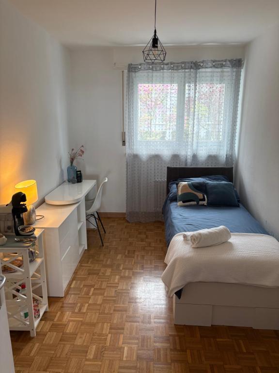 Postel nebo postele na pokoji v ubytování Kami