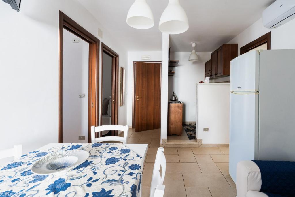 Kuchyň nebo kuchyňský kout v ubytování Appartamento Pineta Mare