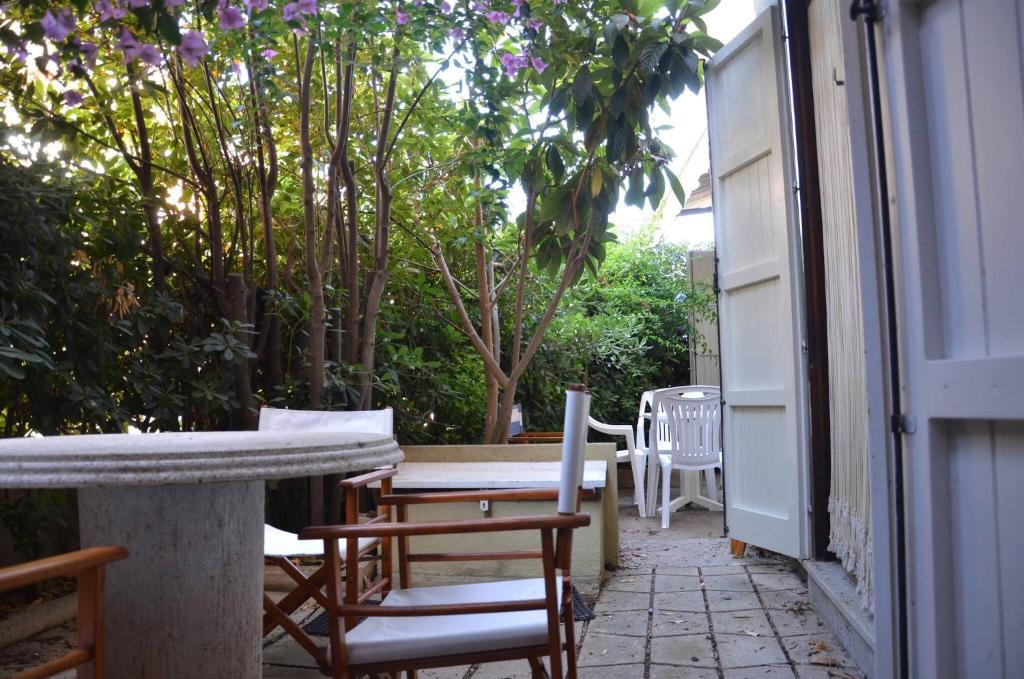 Vonkajšia záhrada v ubytovaní FANTASTIC SARDINIA VILLETTE CON GIARDINO Fronte Mare Fertilia FAHO-GAV01-GAV02