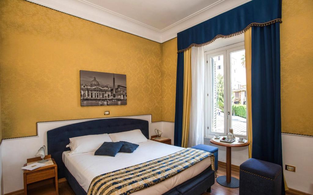 Uma cama ou camas num quarto em iH Hotels Piazza di Spagna View - Luxury Guest House