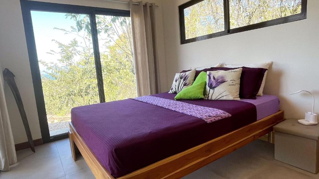 Postel nebo postele na pokoji v ubytování Villas Roma Del Mar