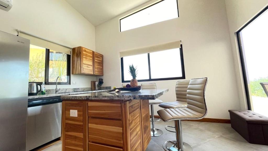Kuchyň nebo kuchyňský kout v ubytování Villas Roma Del Mar