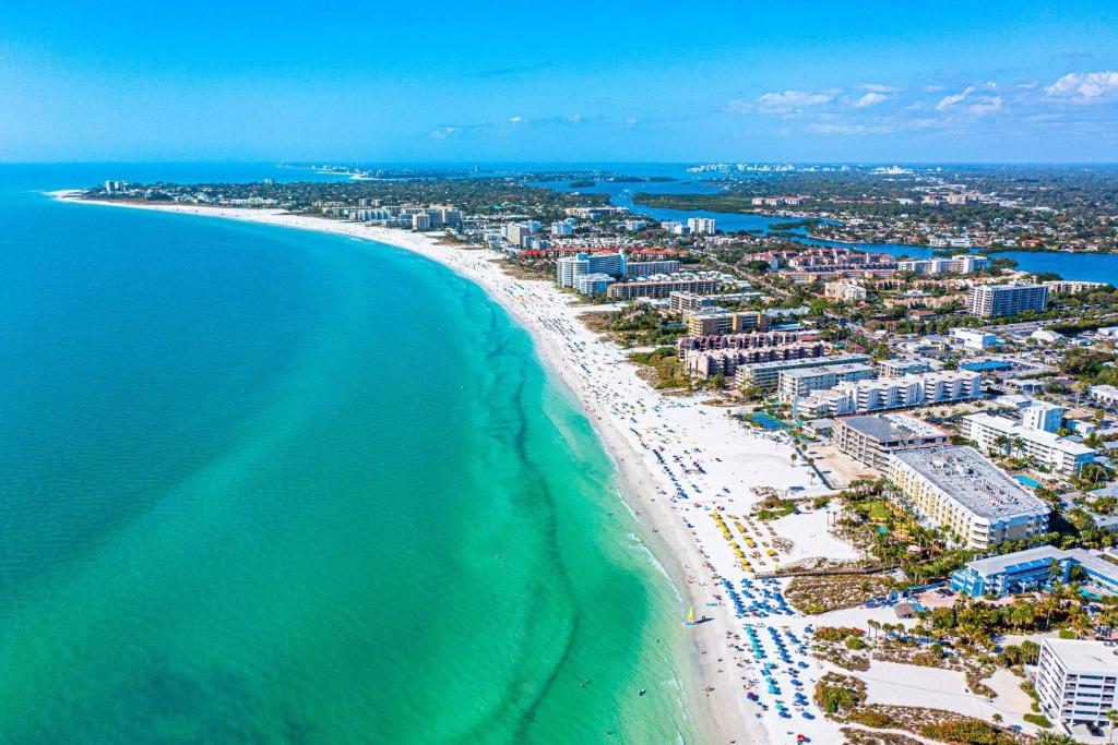 an aerial view of a beach and the ocean at Silver Palm Retreat in Sarasota