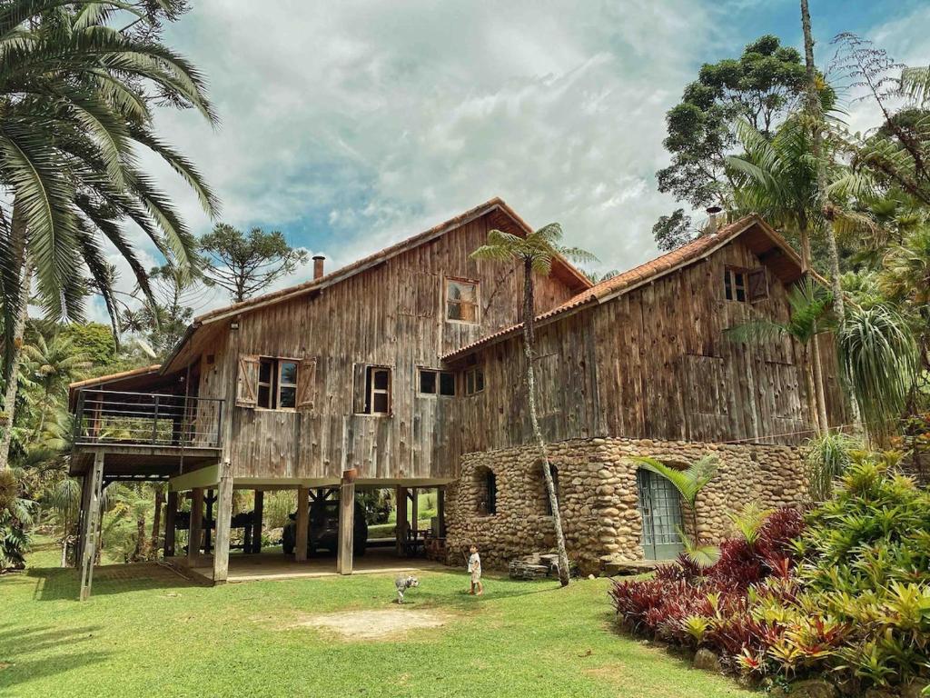 Κήπος έξω από το Rancho Vale das Flores - Cabana de Montanha