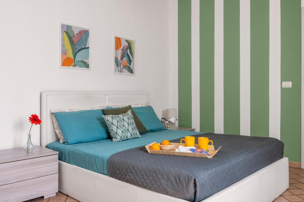 Ένα ή περισσότερα κρεβάτια σε δωμάτιο στο Didi House Duomo