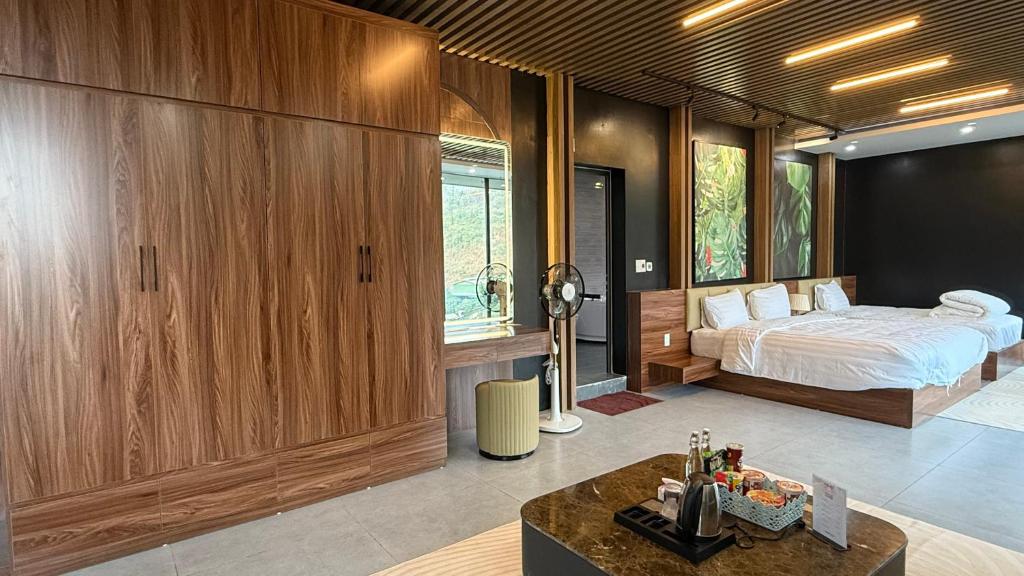Giường trong phòng chung tại Lotus Premium Lodge - Lotus Group Tours