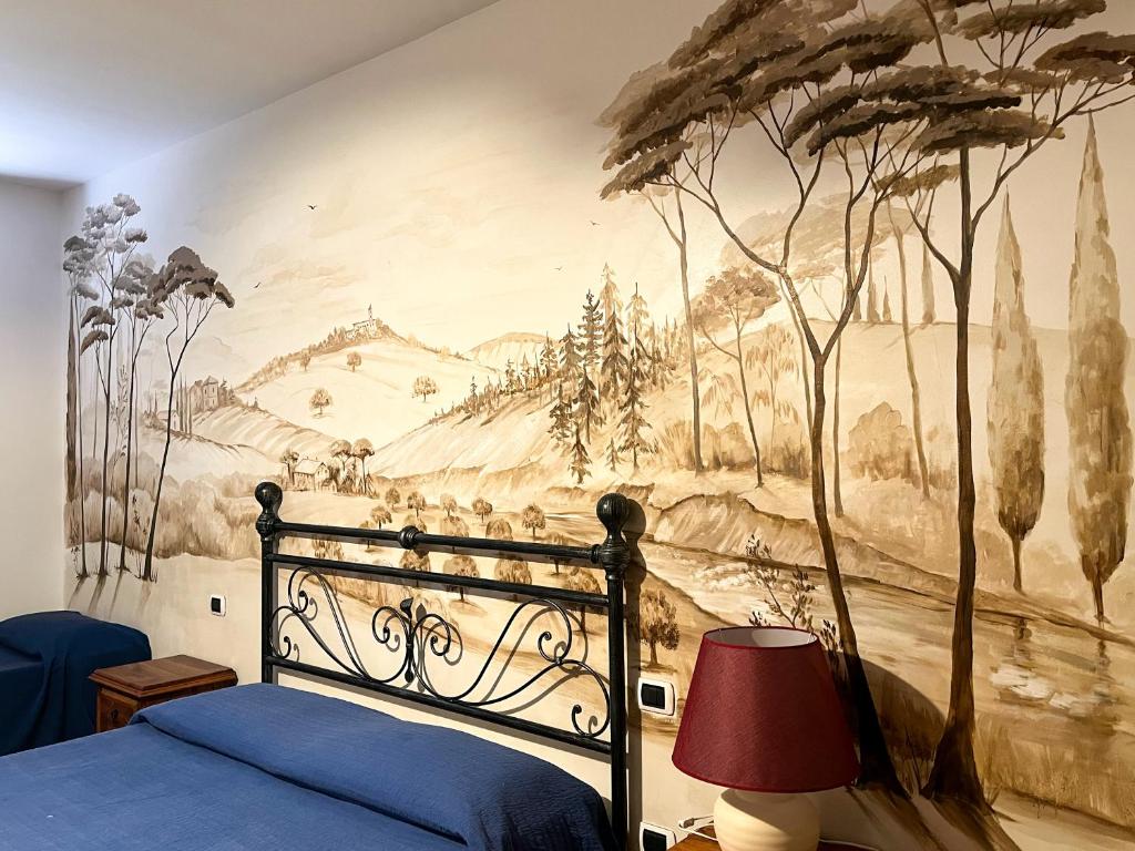 Postel nebo postele na pokoji v ubytování Agriturismo B&B La Sterpina