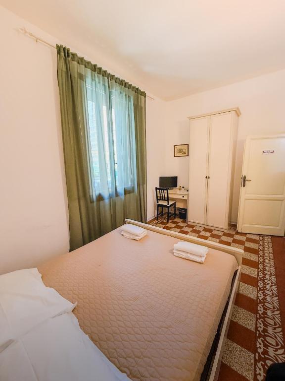 Llit o llits en una habitació de L'Aranceto&stilnovo