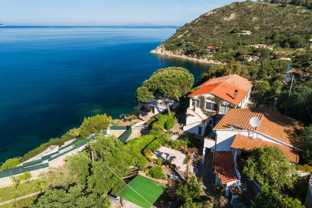 an aerial view of a house on an island in the water at Casa Sabrina in Portoferraio