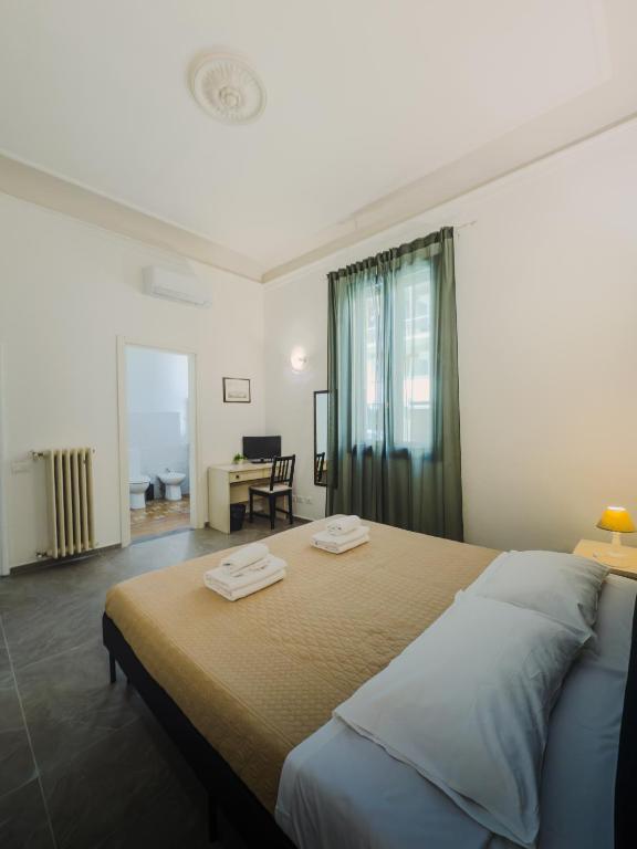 Llit o llits en una habitació de L'Aranceto&stilnovo