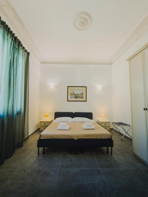 Llit o llits en una habitació de L'Aranceto&stilnovo
