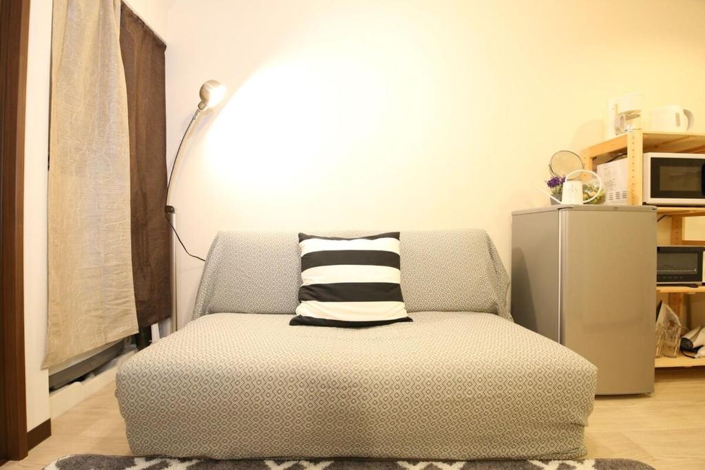 Postel nebo postele na pokoji v ubytování 大阪城公園 6分鐘森之宮站 2層日式小屋 2臥室 獨立衛浴