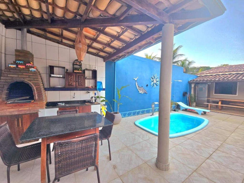 Hồ bơi trong/gần Suítes Arraial 300m do Centro