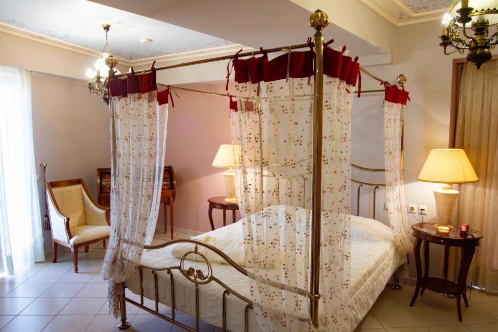 Postel nebo postele na pokoji v ubytování Elena Hotel