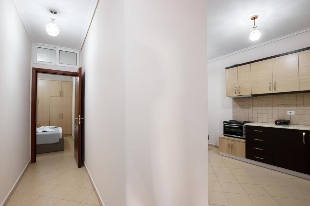 Kuchyň nebo kuchyňský kout v ubytování Ariadne 7 Apartments