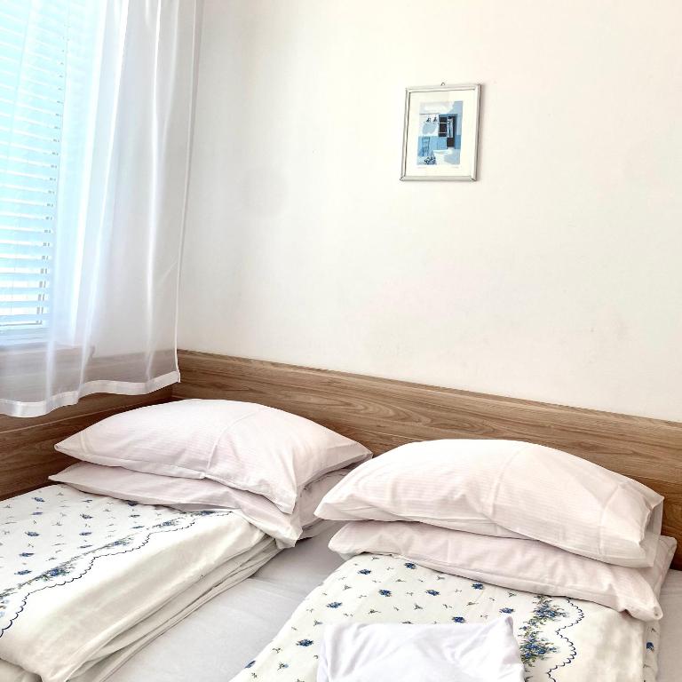 Postel nebo postele na pokoji v ubytování Dom Gościnny Wiki