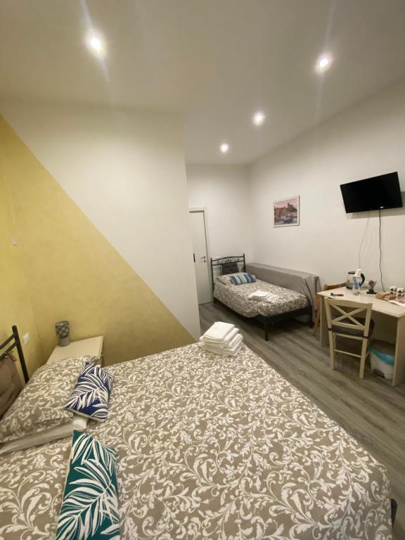 Postel nebo postele na pokoji v ubytování La Perla Del Golfo