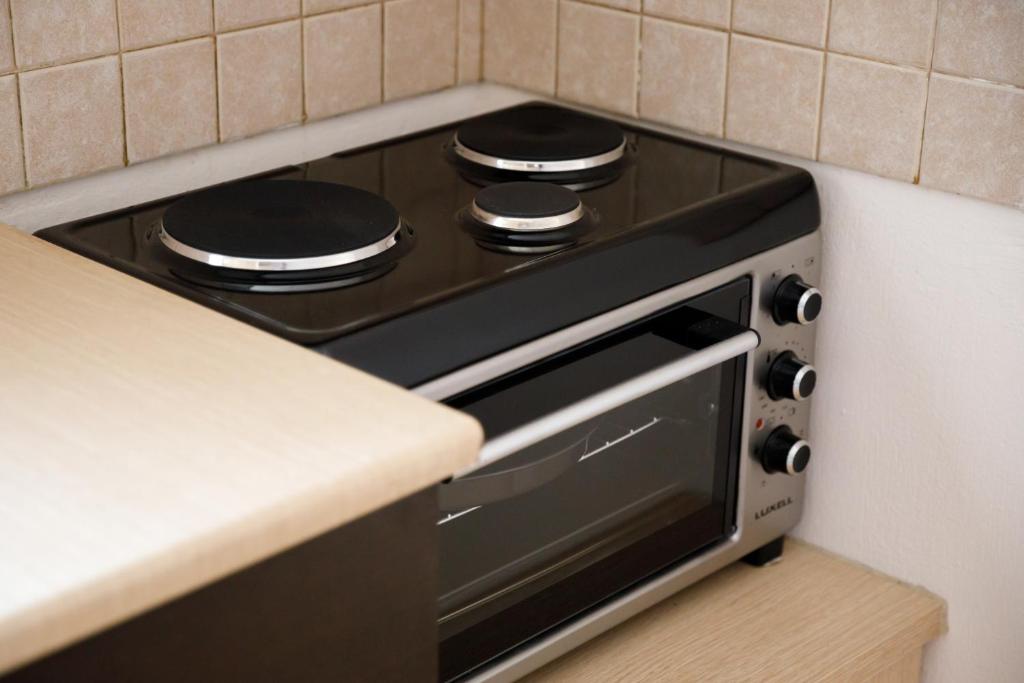 Kuchyň nebo kuchyňský kout v ubytování Ariadne 7 Apartments