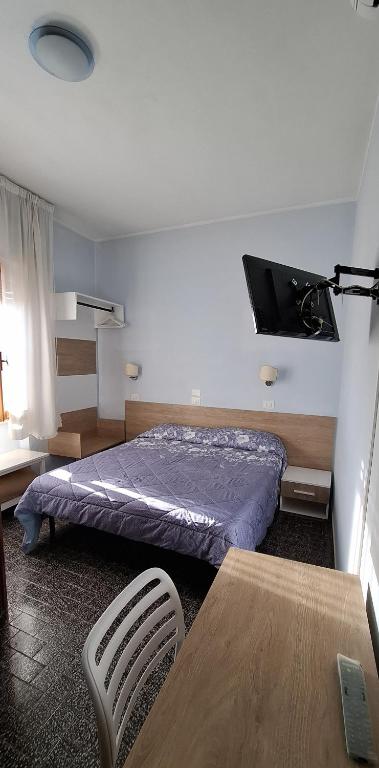 Postel nebo postele na pokoji v ubytování Hotel Lea