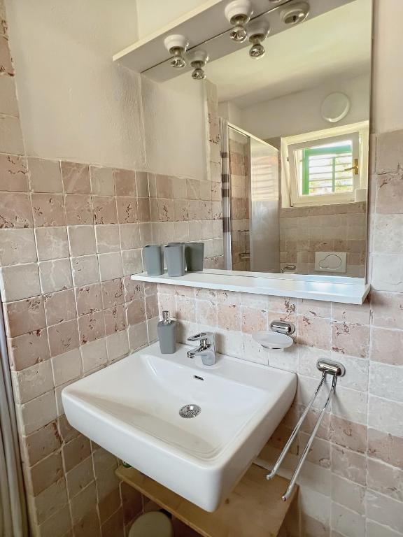 Kúpeľňa v ubytovaní Apartment Dalmatera