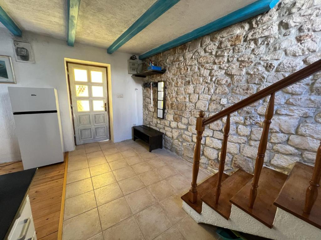 Kuchyňa alebo kuchynka v ubytovaní Apartment Dalmatera