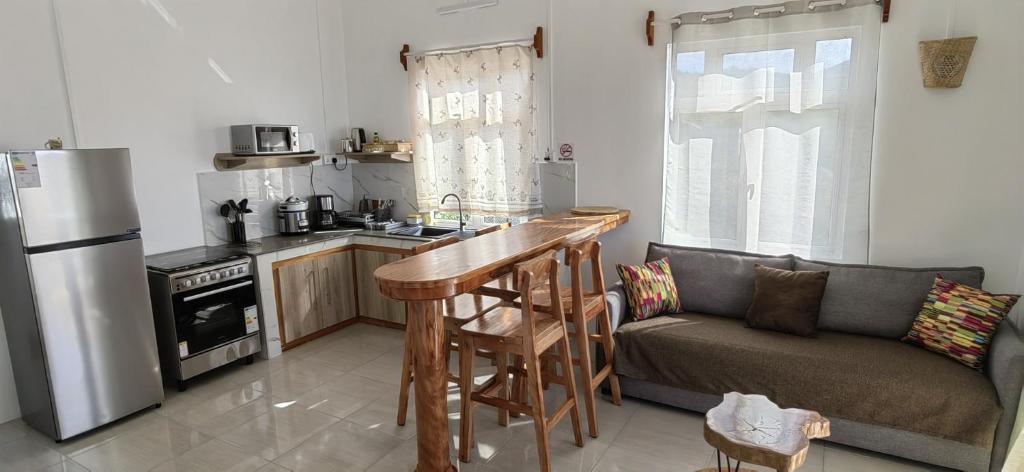 Kuchyň nebo kuchyňský kout v ubytování La Residence Emmaüs