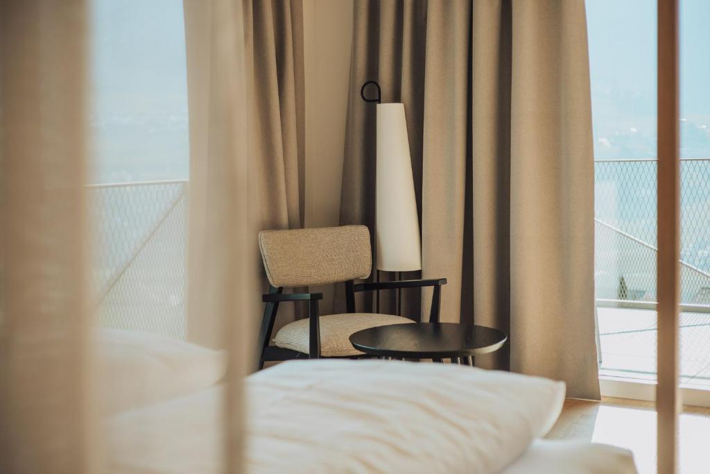 Postel nebo postele na pokoji v ubytování Hotel Lisetta