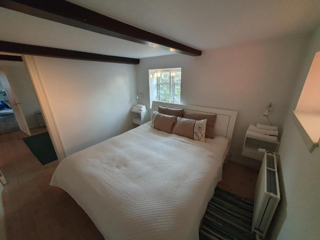 Postel nebo postele na pokoji v ubytování Cozy House