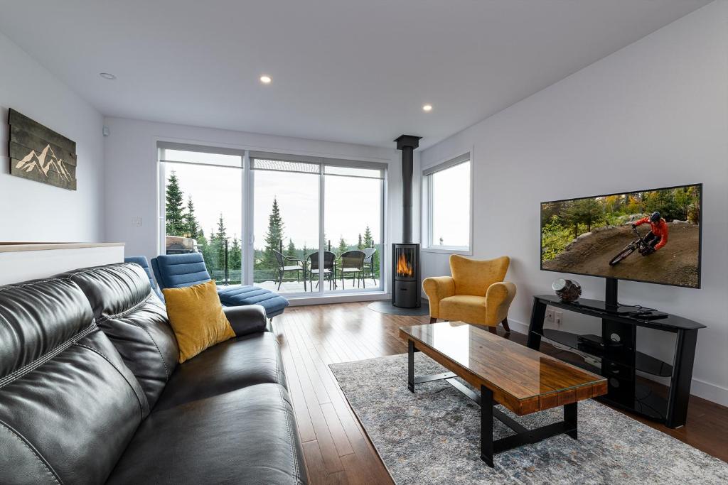 Posezení v ubytování Les Chalets du Massif de Charlevoix