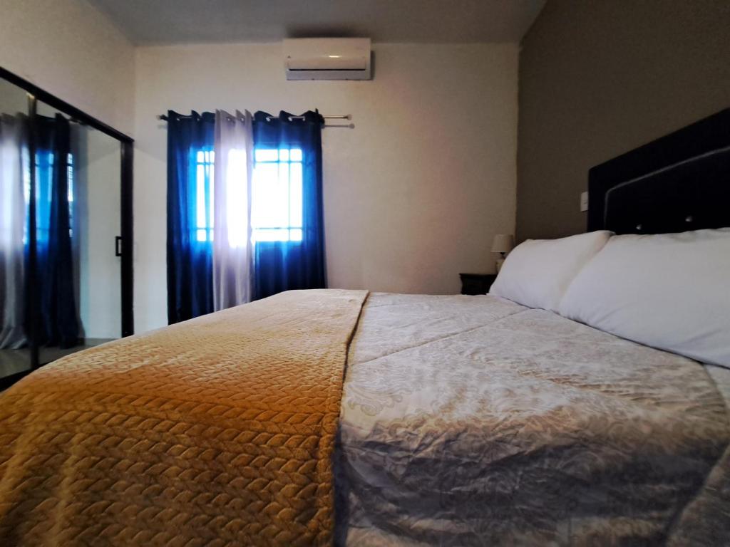 Postel nebo postele na pokoji v ubytování PL Residencia