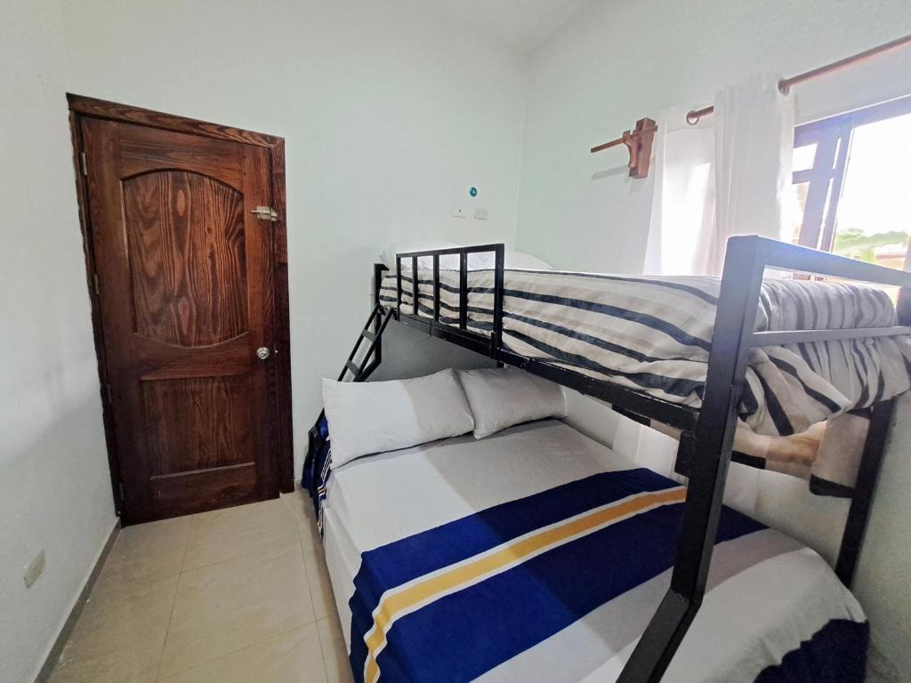Postel nebo postele na pokoji v ubytování PL Residencia