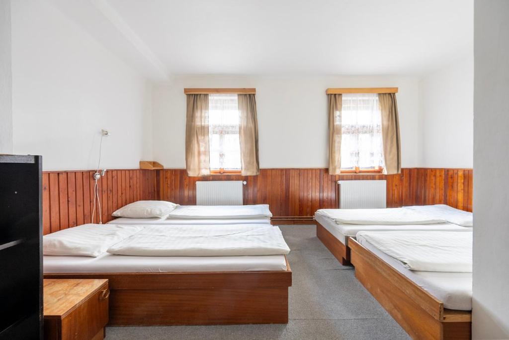Postel nebo postele na pokoji v ubytování Chata Čert