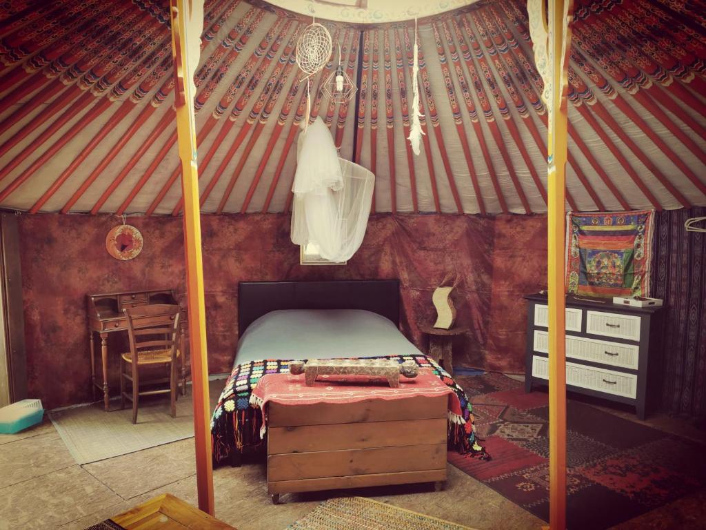 Postel nebo postele na pokoji v ubytování Yourte Namaste Homestay