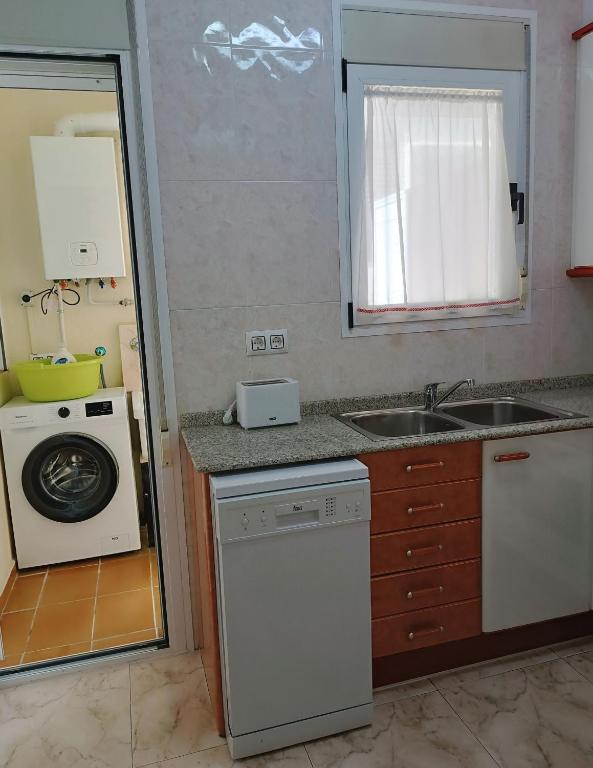 Kuchyň nebo kuchyňský kout v ubytování Apartamentos Querol