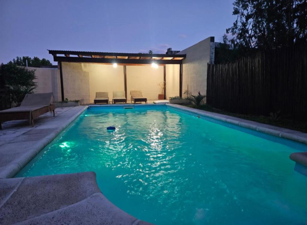 Bazén v ubytování Complejo Olmos 1835 nebo v jeho okolí