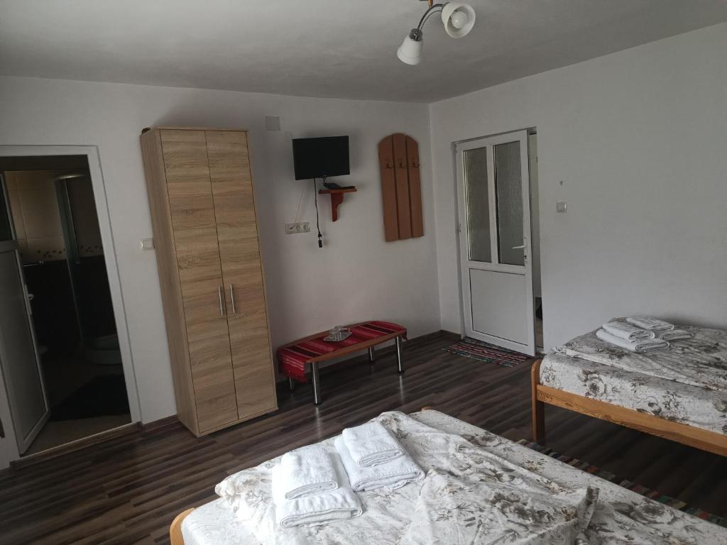 Postel nebo postele na pokoji v ubytování Cabana Colț de Rai