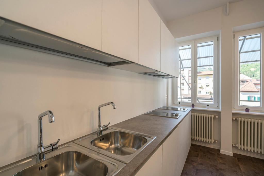 Kuchyň nebo kuchyňský kout v ubytování Stay COOPER l Capitol Rooms