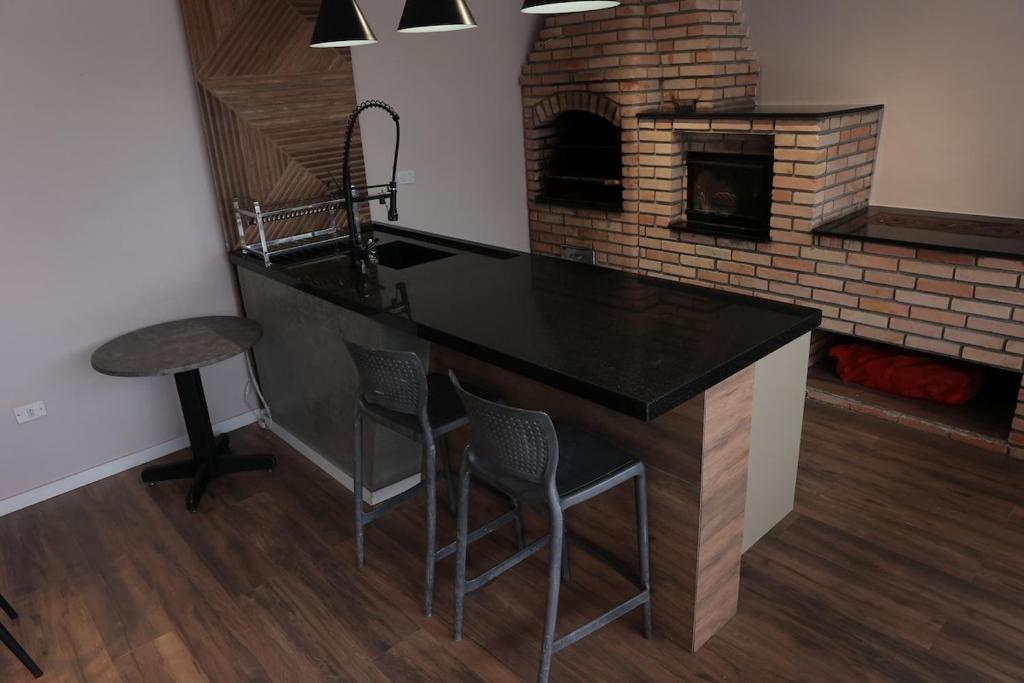 Nhà bếp/bếp nhỏ tại Casa de Temporada Luxo - Piscina, Área Gourmet e Vista Espetacular!