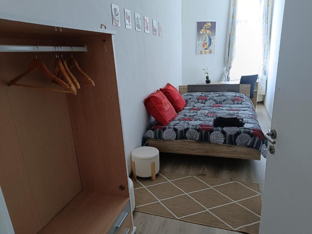 Postel nebo postele na pokoji v ubytování Chez Opportune