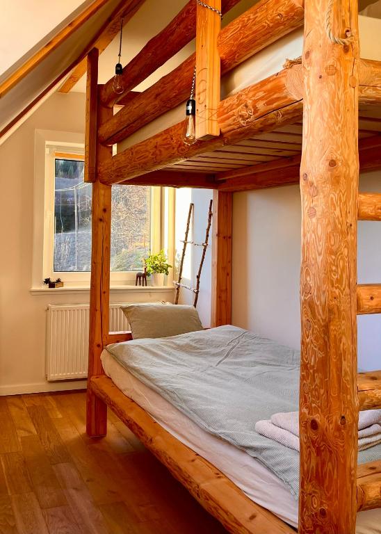 Posteľ alebo postele v izbe v ubytovaní Przysiółek Flądrówka - Dom na odludziu z widokiem na Gorce i Tatry