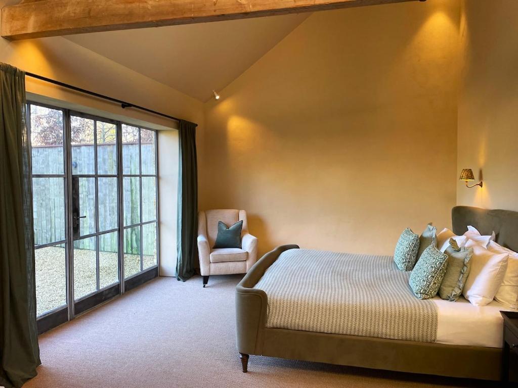 Posezení v ubytování Converted Barn in Sibford Gower