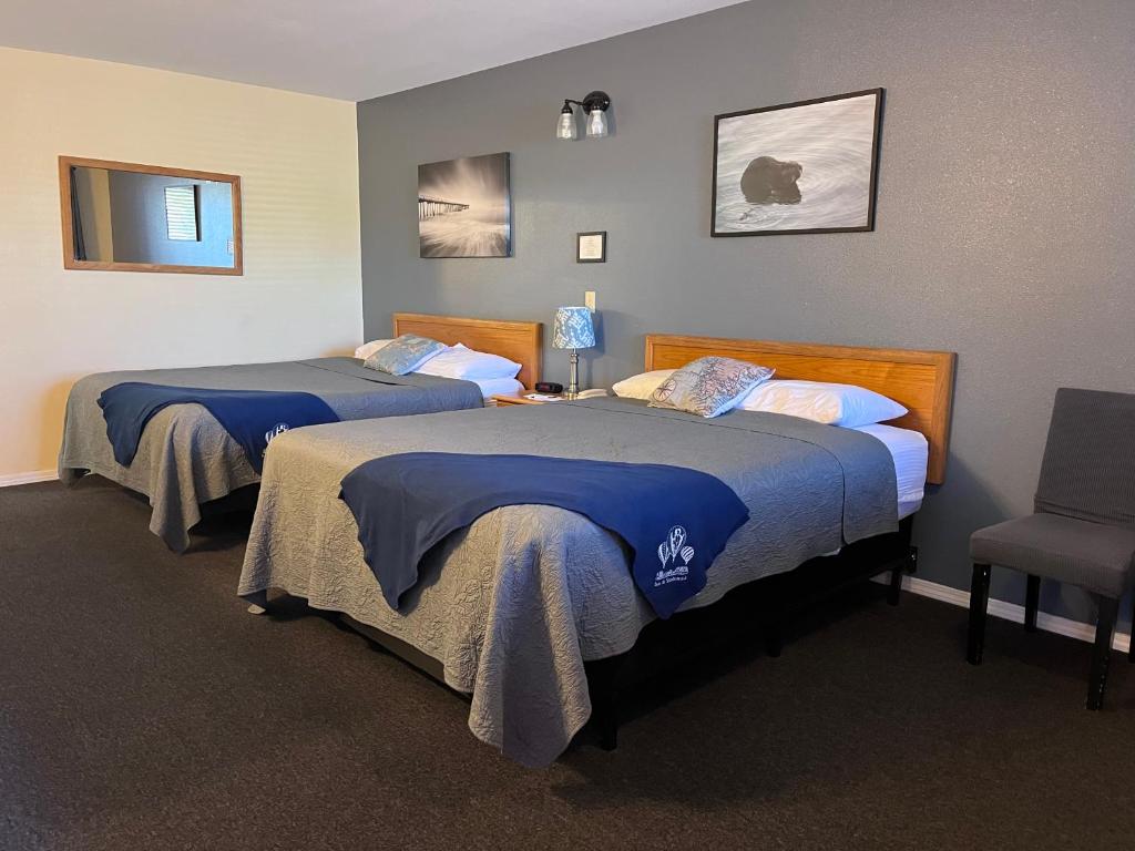 Postel nebo postele na pokoji v ubytování Snohomish Inn