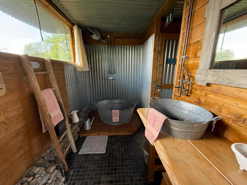 Posezení v ubytování La Cabane Du Verger